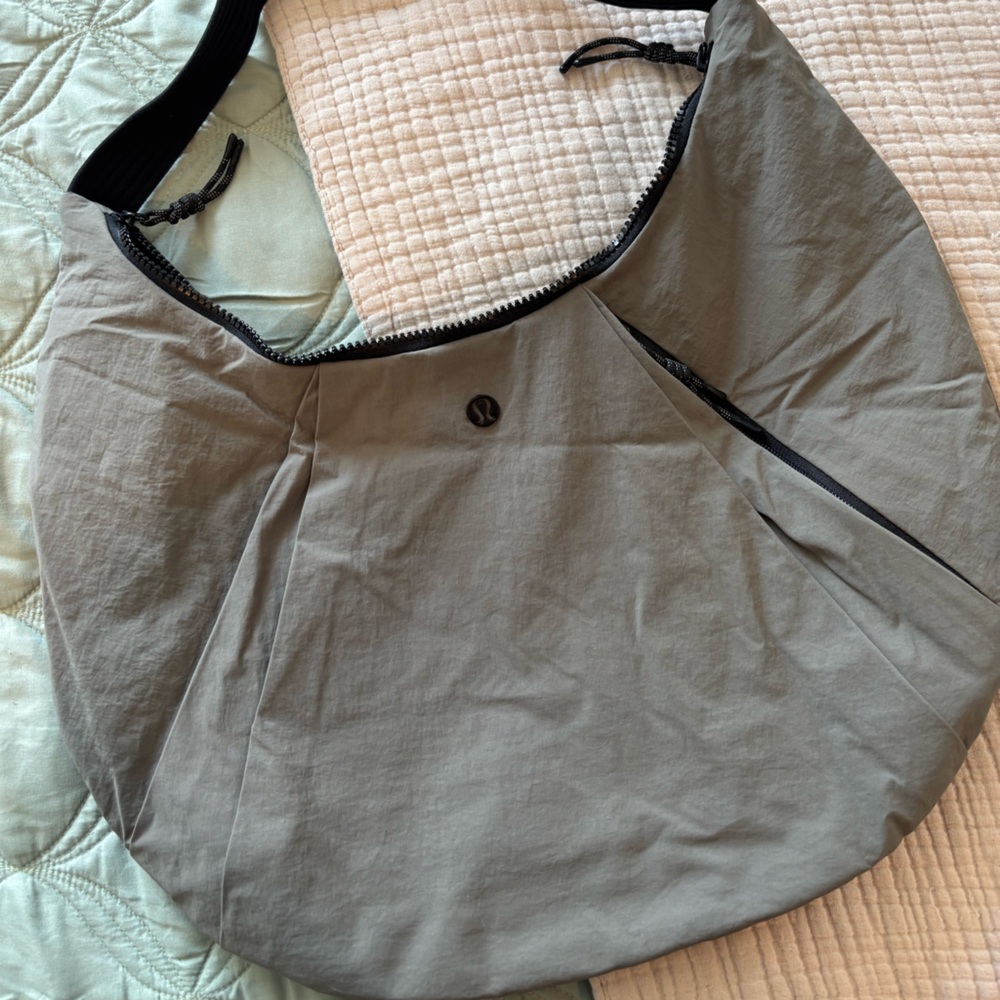lululemon black and gray zip-top shoulder sling bag